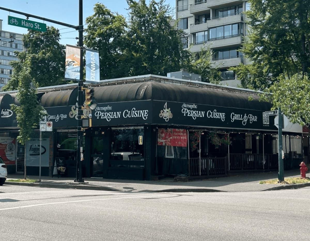 The Sadra Persian Cuisine storefront on the corner of Denman and Haro